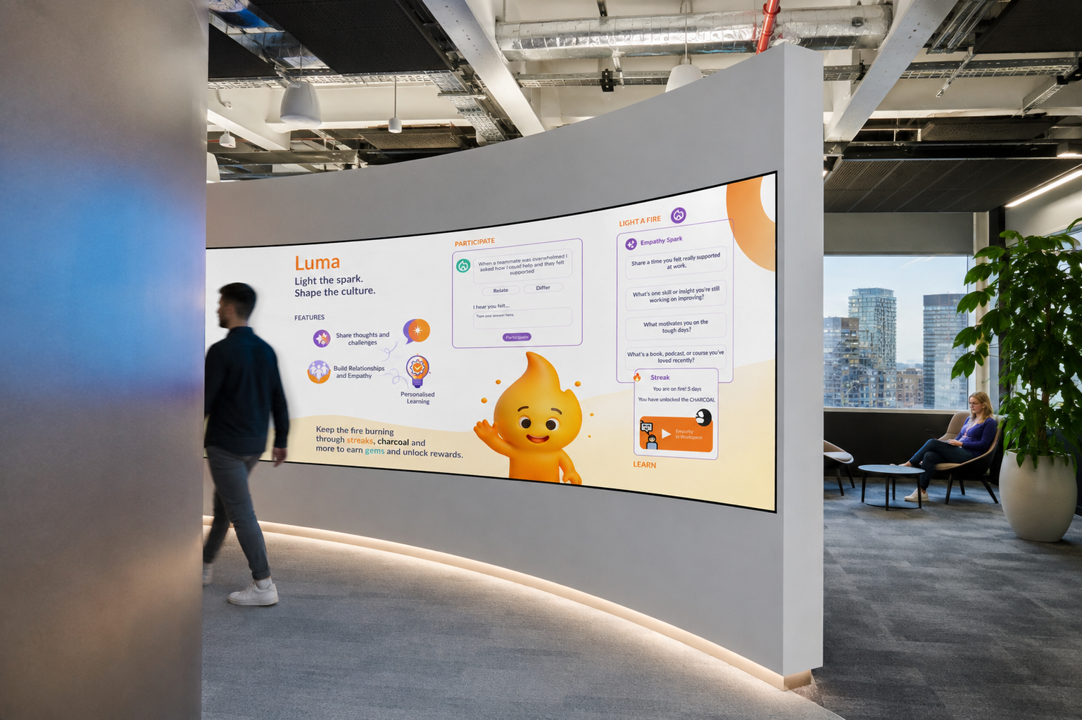 Luma, large screen mockup in a workplace